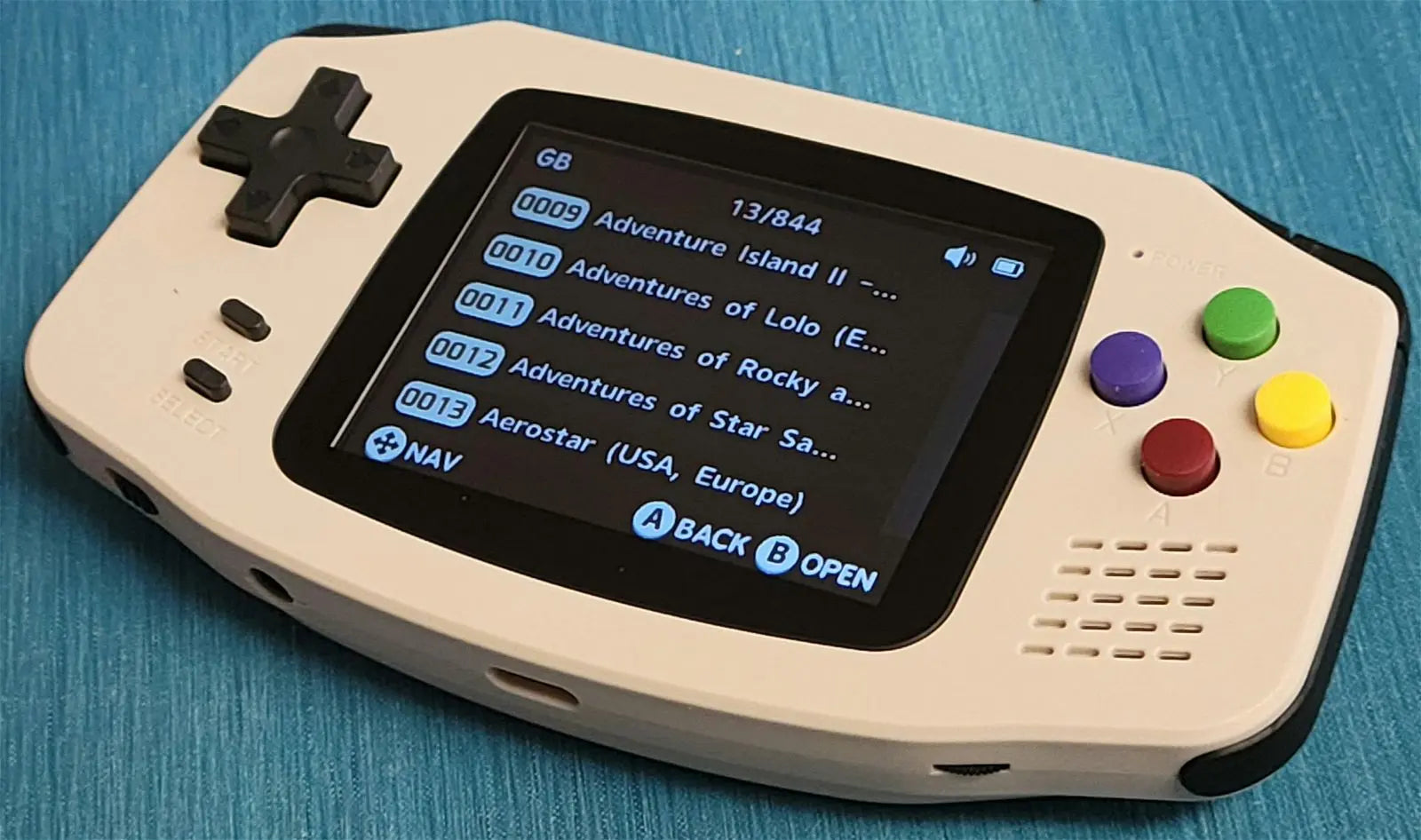 New powkiddy A30 ultra portable retro handheld gaming console, GBA design, 32GB plug and play - Arcadeclassics